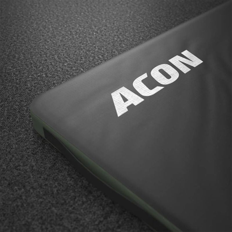 Close-up of a green eACON Crash Mat Green Model showing it's brand name