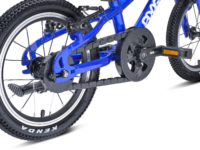 Close-up of Frog 38 children's bike with chain and sprocket on a white background