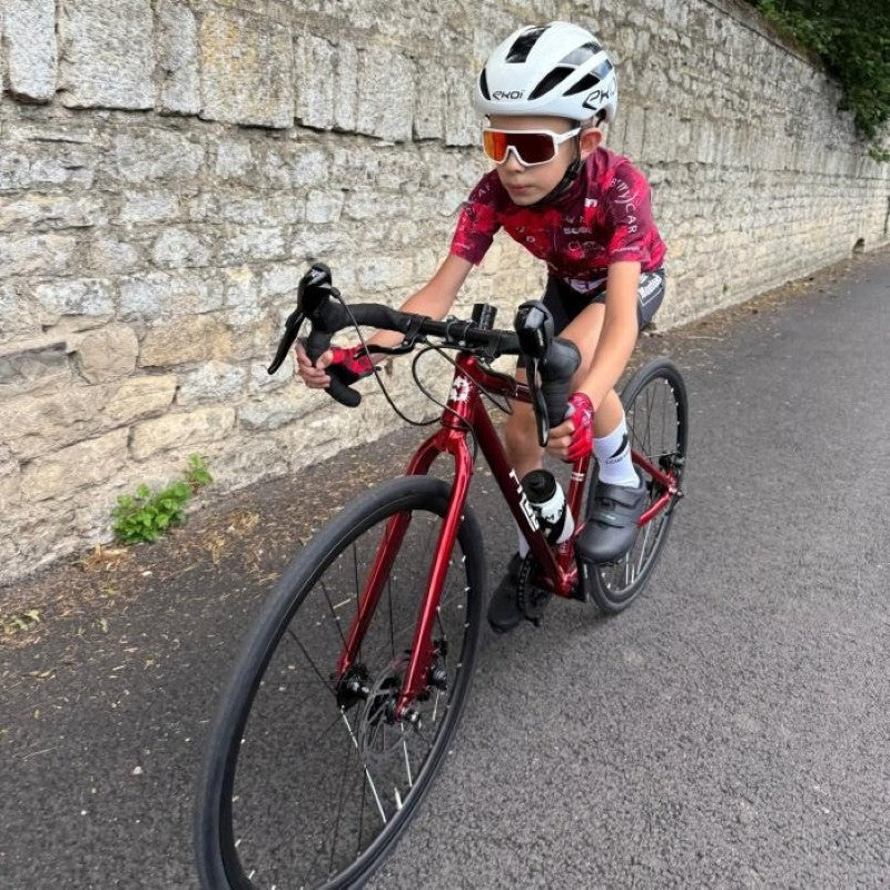 kid riding a frog road 67 bike