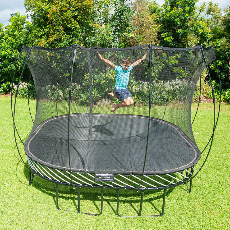 Springfree® 11ft Deluxe Square Trampoline with kid jumping