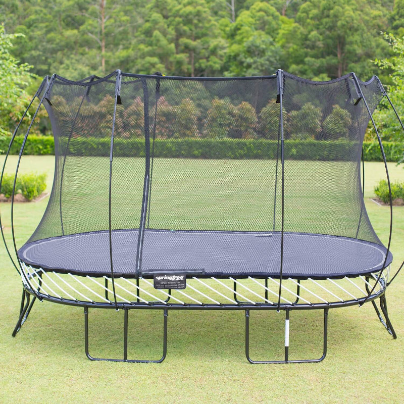 Springfree® 8ft x 13ft Large Oval Trampoline front view at the garden